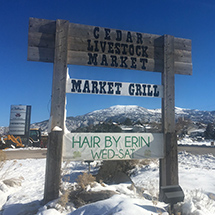 Cedar Livestock Market and Market Grill sign