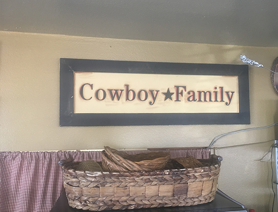 Cowboy Family sign in the dining room